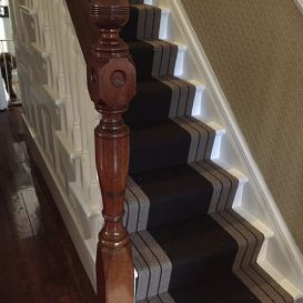 French polished staircase handrail and newel post